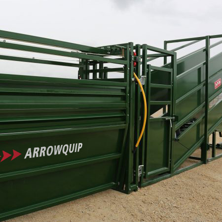Vet cage in Arrowquip handling system between Easy Flow Adjustable Cattle Alley and Loading Chute