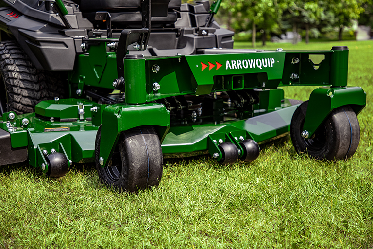 Close-up of Arrowquip 720 commercial zero-turn mower frame and caster wheels for stability