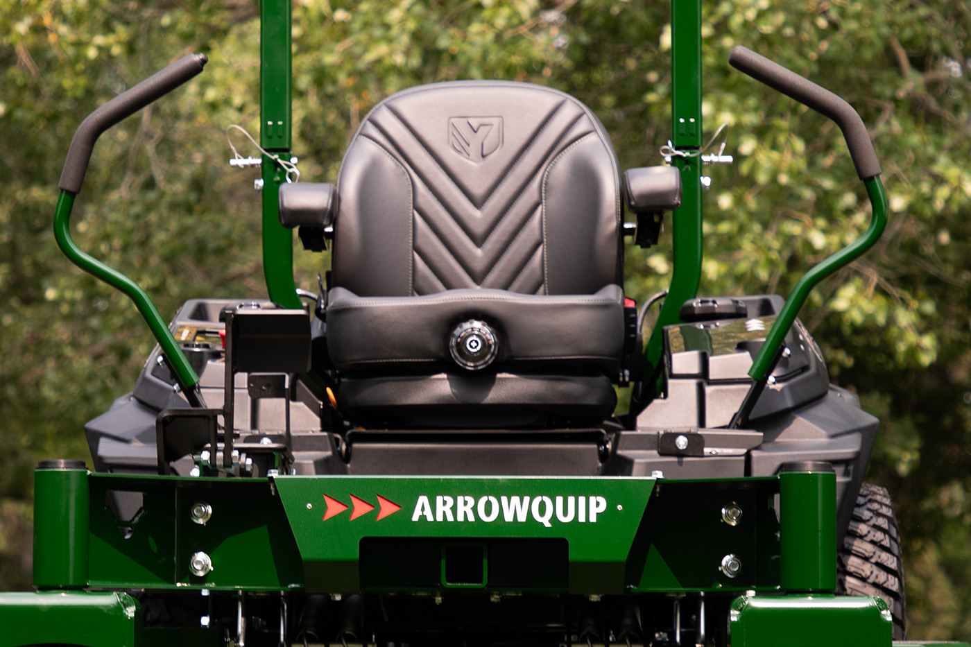 Front seat view of Arrowquip 720 zero-turn mower showing ergonomic seat and operator controls