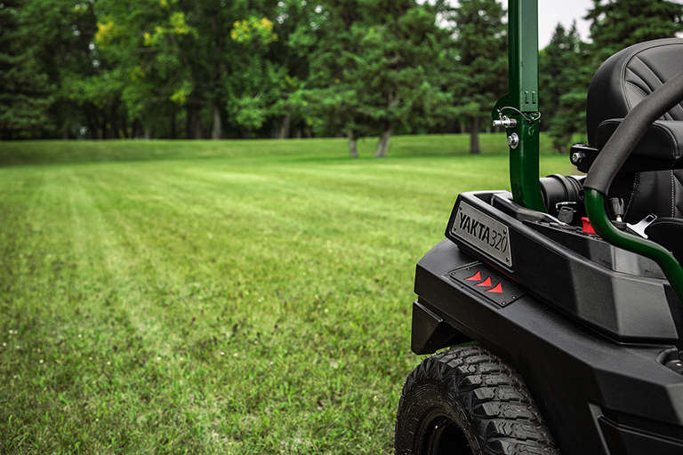Rear view of Arrowquip Mowers zero-turn mower with dual gas tanks for extended mowing time