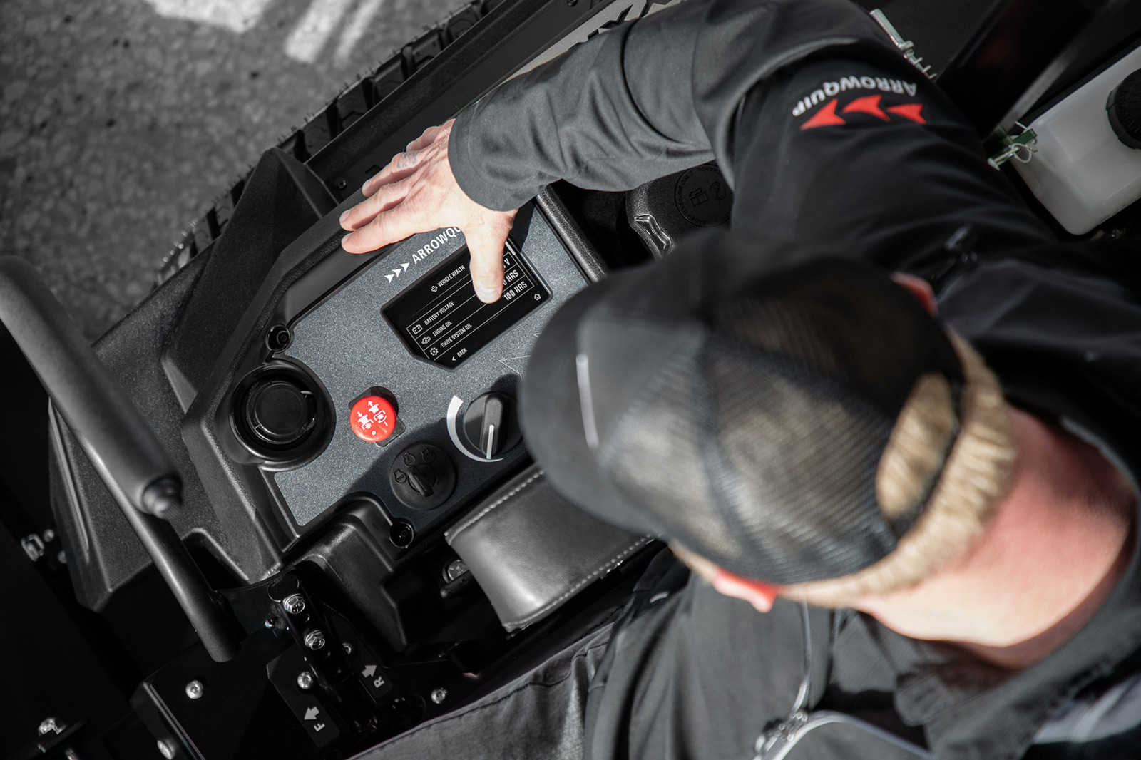 mower operator using digital display on Yakta 720