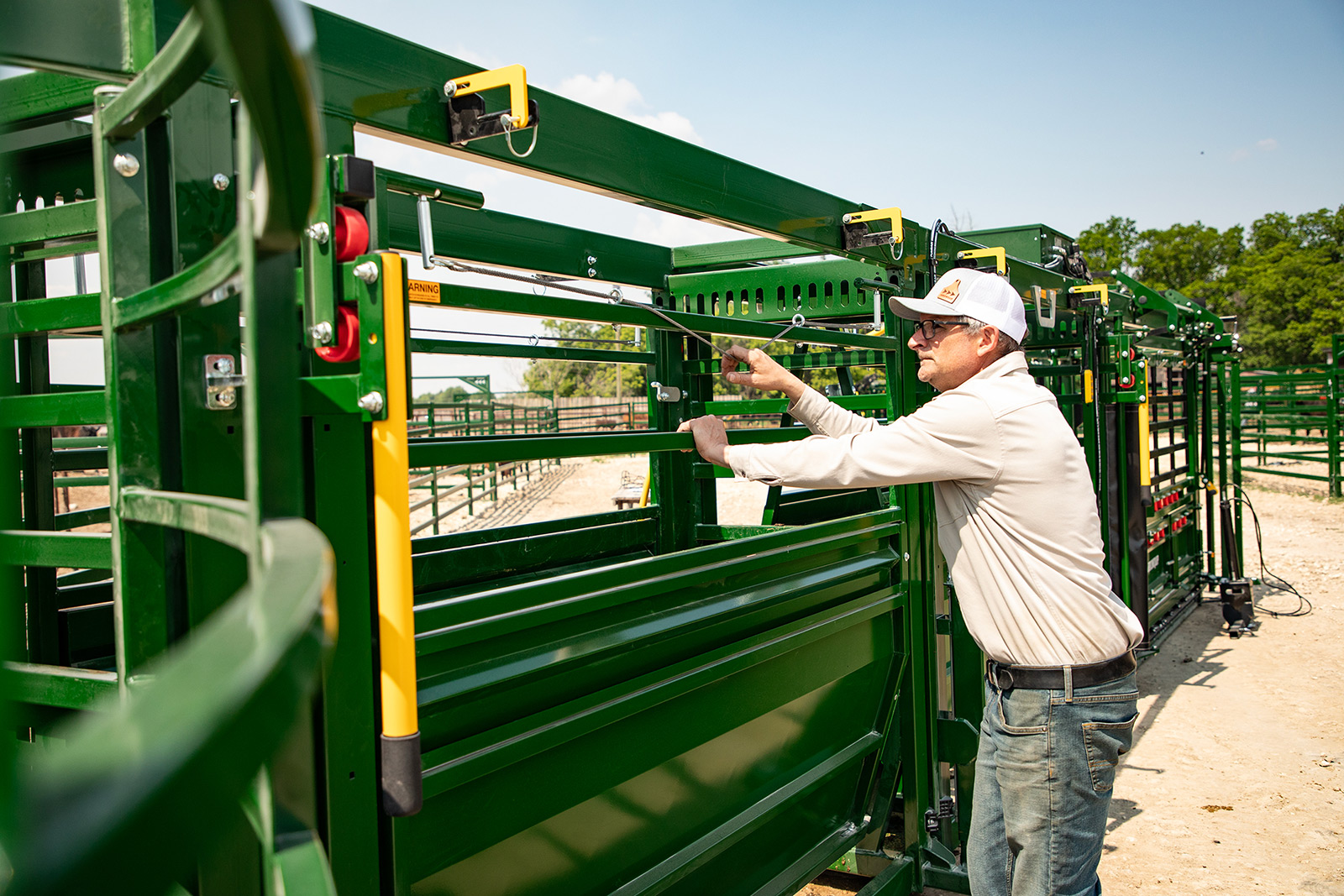 Man adjusting width of Arrowquip Alley