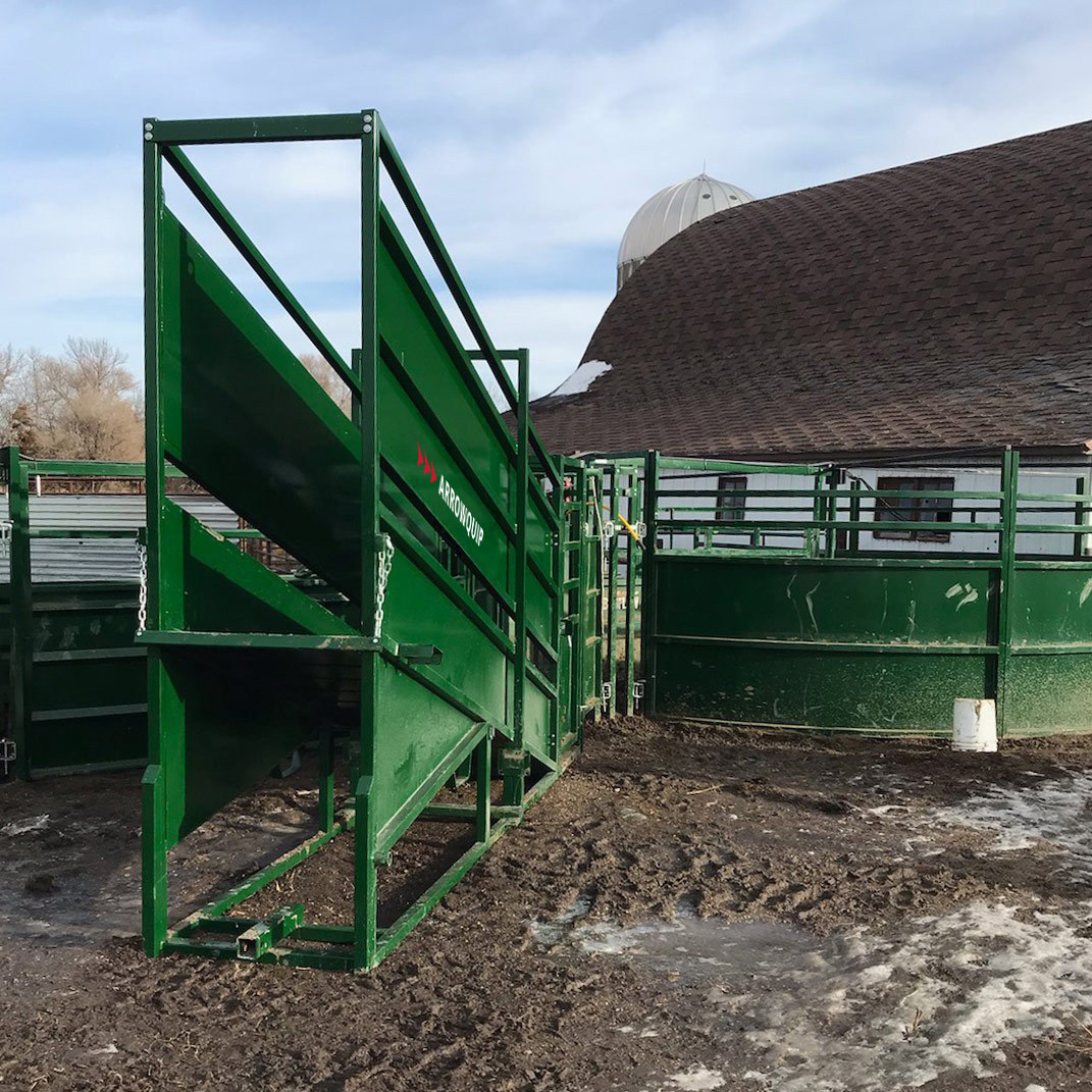 Cattle loading ramp included in a full cattle handling system on a ranch