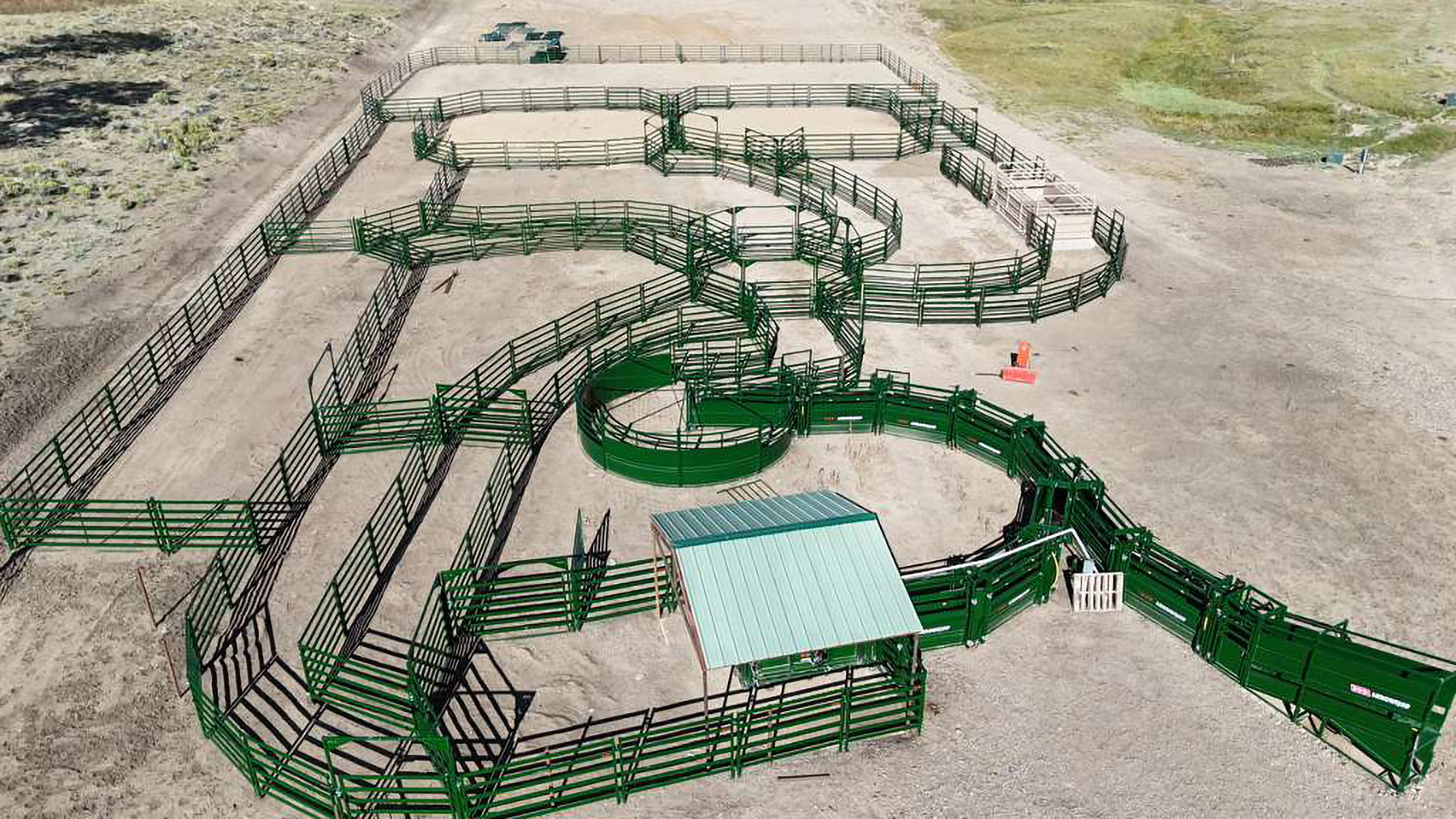 Angled aerial view of Arrowquip cattle handling system ready to work cattle with loading chute, alleyway, cattle tub, draft pound and cattle chute