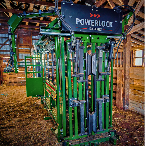 Powerlock hydraulic chute inside barn in winter ready to work