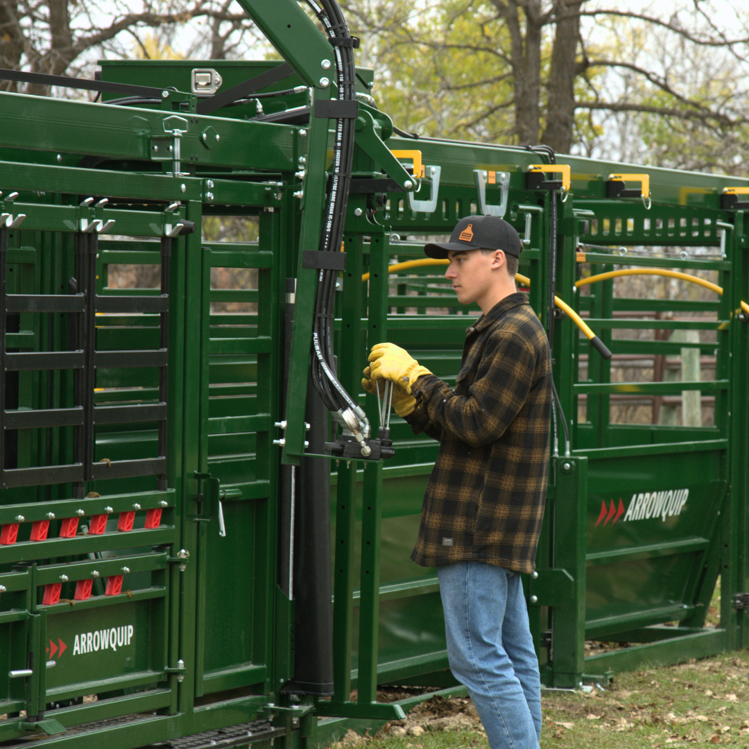 Arrowquip's Powerlock 108 Series Hydraulic cattle chute being used by a rancher
