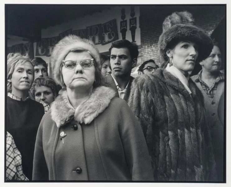 Photo of a spectator watching Miss Universe parade