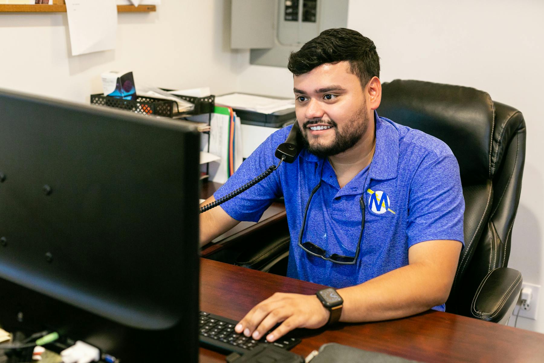 Mabry'c Electrical Inc Happy Employee in the Office