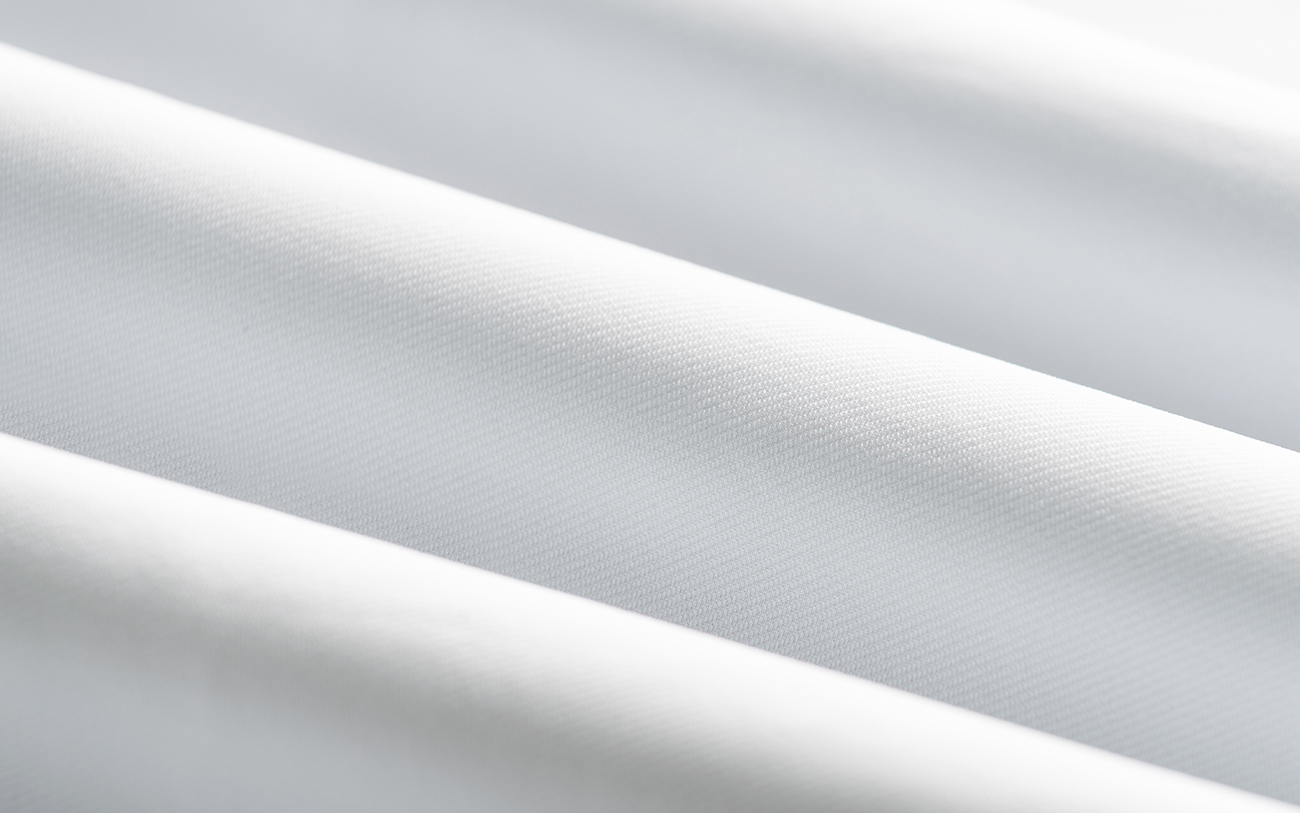 Close-up of White Fabric Rolls