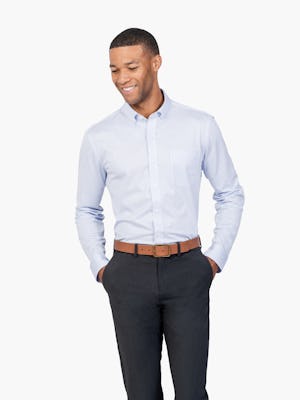 Men’s Blue Stripe Gemini Knit shirt model facing forward with hands in pockets