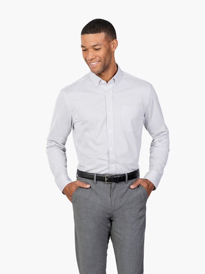 Men’s Grey Stripe Gemini Knit shirt model facing forward with hands in pockets