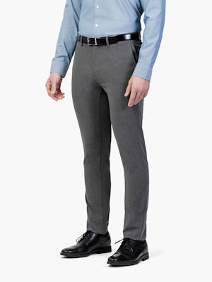 Men's Charcoal Velocity Dress Pants on Model Facing Left