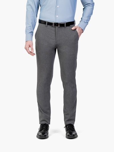 Men's Charcoal Velocity Dress Pants on Model Facing Forward with Hand in Pocket