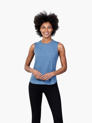 Women's Storm Blue (Recycled) Composite Merino Tank on Model with Hands in Front of Her