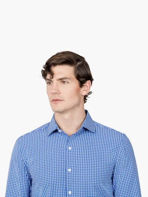 Men’s Blue Grid Aero Zero Dress shirt headshot of model looking to the right