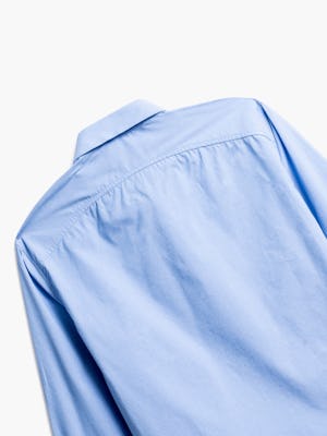 close up of men's solid blue nylon aero dress shirt shot of back