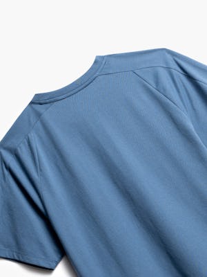 close up of men's storm blue composite active tee shot of back
