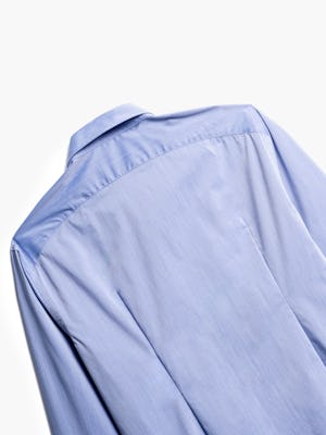 close up of men's blue gemini button down shot of back