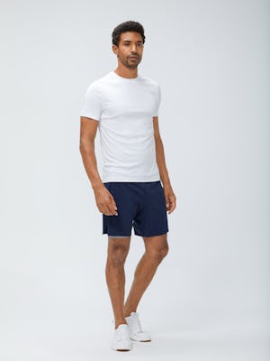 Men's White Responsive Crew Neck Tee and Navy Newton Active Shorts on Model Facing Right