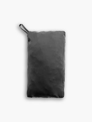 men's charcoal kinetic light layer packed into itself