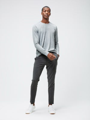 Men's Charcoal Grey Heather Composite Merino Long Sleeve Tee and Men's Graphite Velocity Tapered Pant on model facing forward