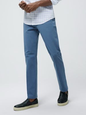 Close up of Men's Storm Blue Momentum Chino on model