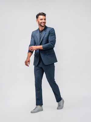 Men's Azurite Heather Velocity suit on model walking