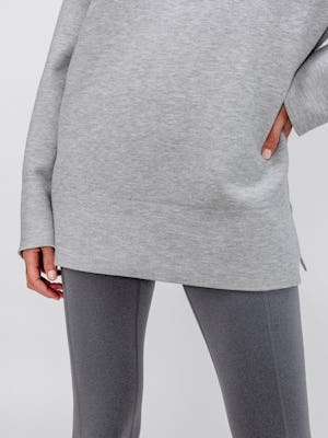 women's light grey 3d print knit slouchy sweater and charcoal heather joule active legging zoomed shot of bottom hem