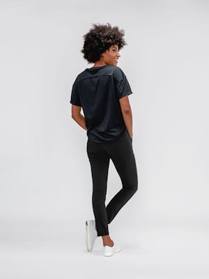 Women's Black Velocity Tapered Pant on model facing back