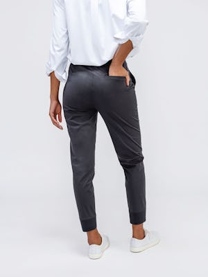 Women's Slate Grey Kinetic Pull On Pant on model facing backwards with hand in pocket
