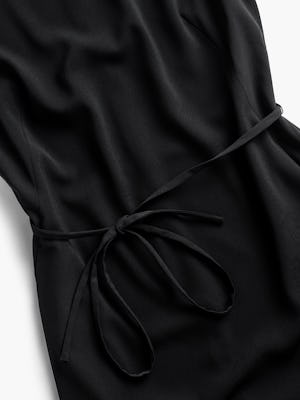 women's black swift sheath dress zoomed shot of waist tie