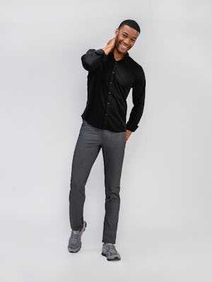 Men's Black Apollo Raglan Sport Shirt and Medium Grey Heather Kinetic Twill 5-Pocket Pant on model walking forward