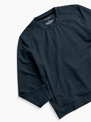 men's black heather fusion terry sweatshirt zoomed shot of front with sleeve in pocket