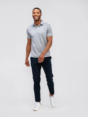 model wearing mens kinetic jogger black and mens apollo polo grey standing shot