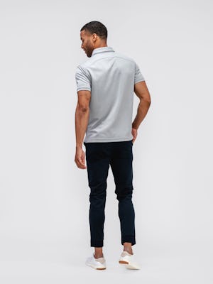 Back of Men's Grey White Heather Apollo Polo and Black Kinetic Jogger on model