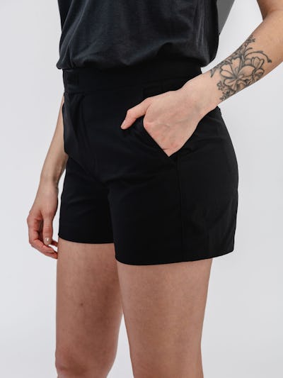 Women's Black Pace Poplin shorts on model with hand in pocket