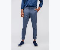 Men's Indigo Heather Kinetic Tapered Pant on model with hand in pocket
