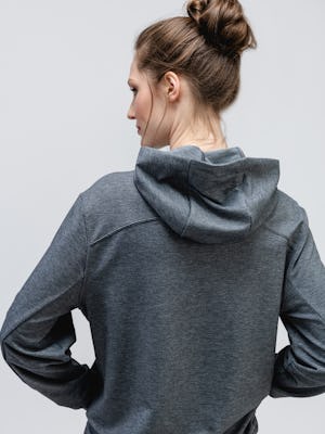 female model wearing classic grey heather fusion terry for all hoodie facing away