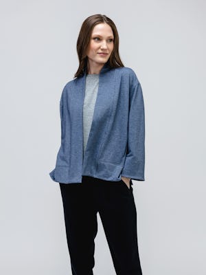 model wearing women's indigo heather fusion terry cardigan and black heather fusion terry jogger and pale grey heather composite merino boxy tee facing forward with hands in pockets