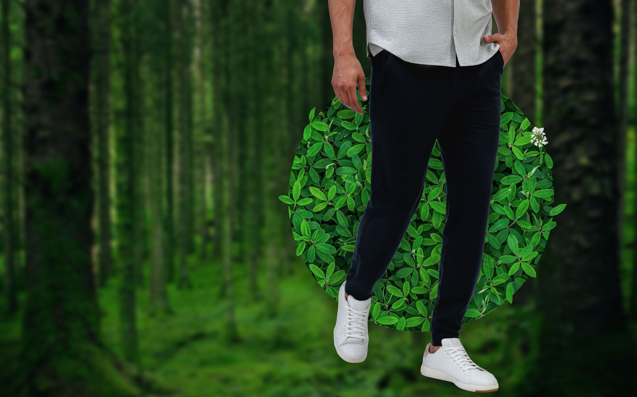 model wearing men's fusion terry jogger in a forest