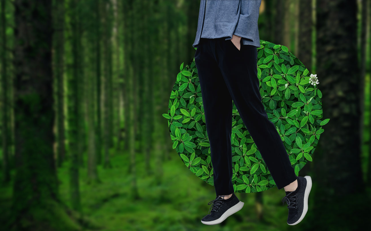 woman wearing fusion terry joggers in a forest