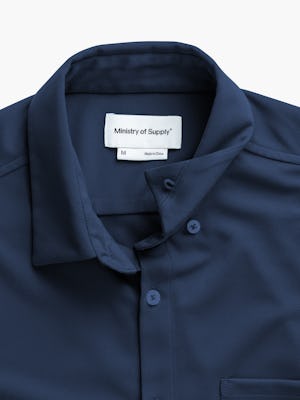 men's navy apollo short sleeve sport shirt zoomed shot of hidden collar buttons