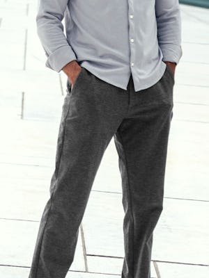 model wearing mens fusion jogger navy heather standing both hands in pocket waist down