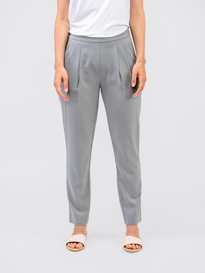 model wearing womens seift drape pant light grey and womens luxe touch tee white waist down standing arms on side