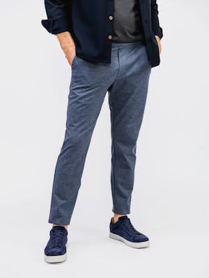 model wearing mens fusion jogger navy heather both hands in pocket