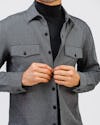 model wearing mens fusion overshirt black tweed  and mens kinetic tapered pant black zoom chest up body shot