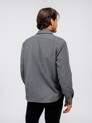 model wearing mens fusion overshirt black tweed