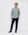 model wearing mens atlas waffle roll neck sweater grey heather and mens kinetic jogger navy front full body