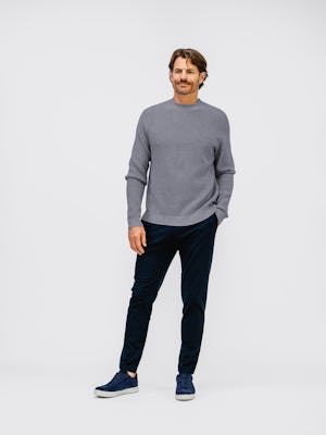 mens atlas waffle roll neck sweater indigo heather and kinetic jogger navy full body one hand in pocket front