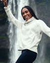 model wearing womens hybril fleece funnel neck soft marble waterfall behind lifestyle